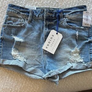 Eunina Distressed Light Blue Jean Shorts. Size S